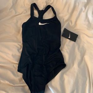 Nike one piece swim suit, open back, new with tags never been worn